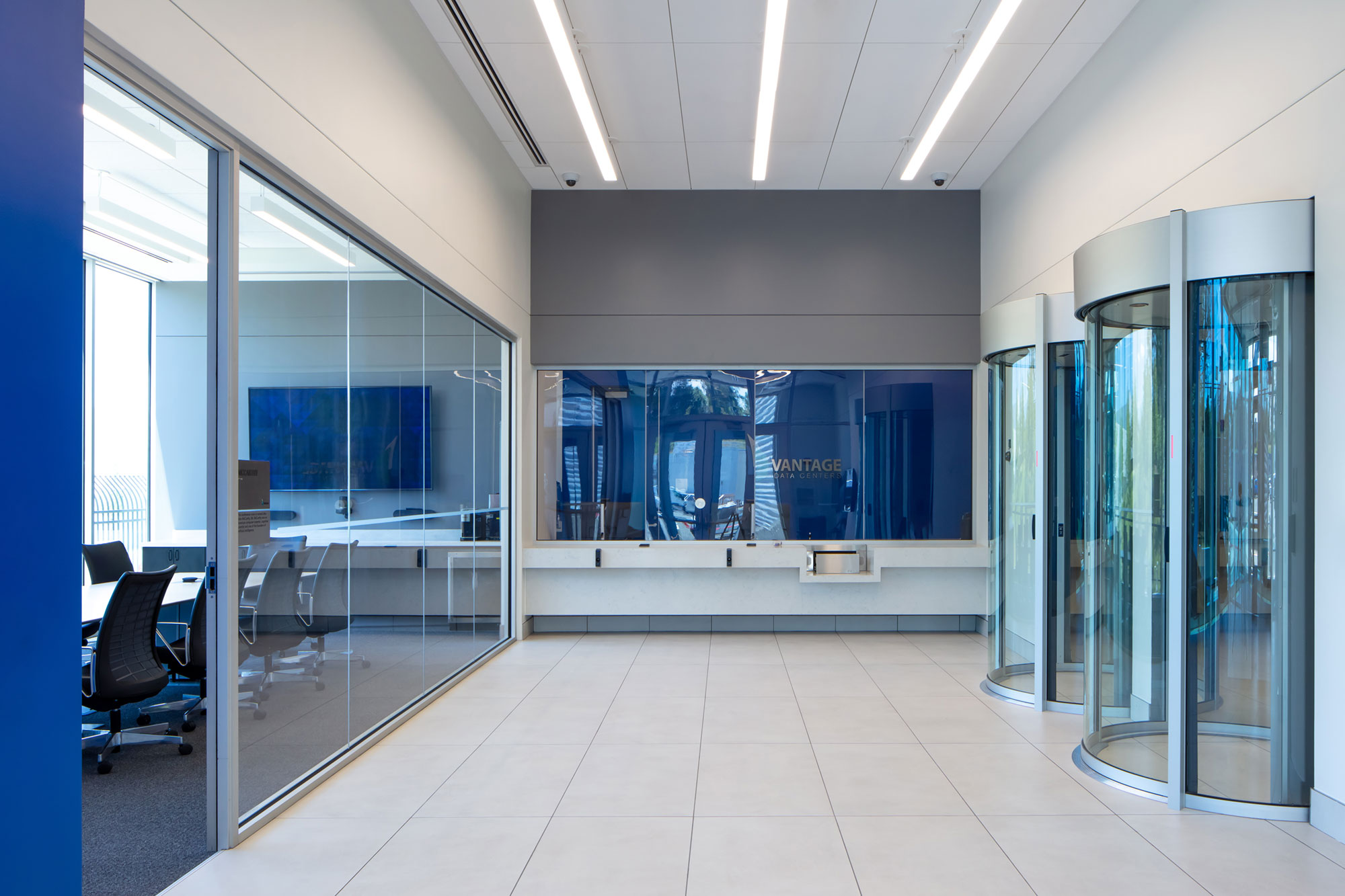 Brightly lit entrance to an office building with large windows
